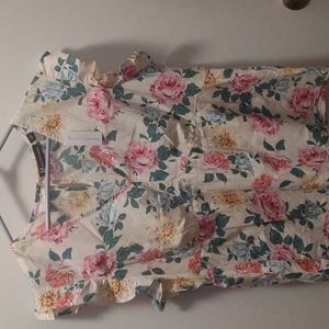 Flowered shirt. brand new. Never Worn.